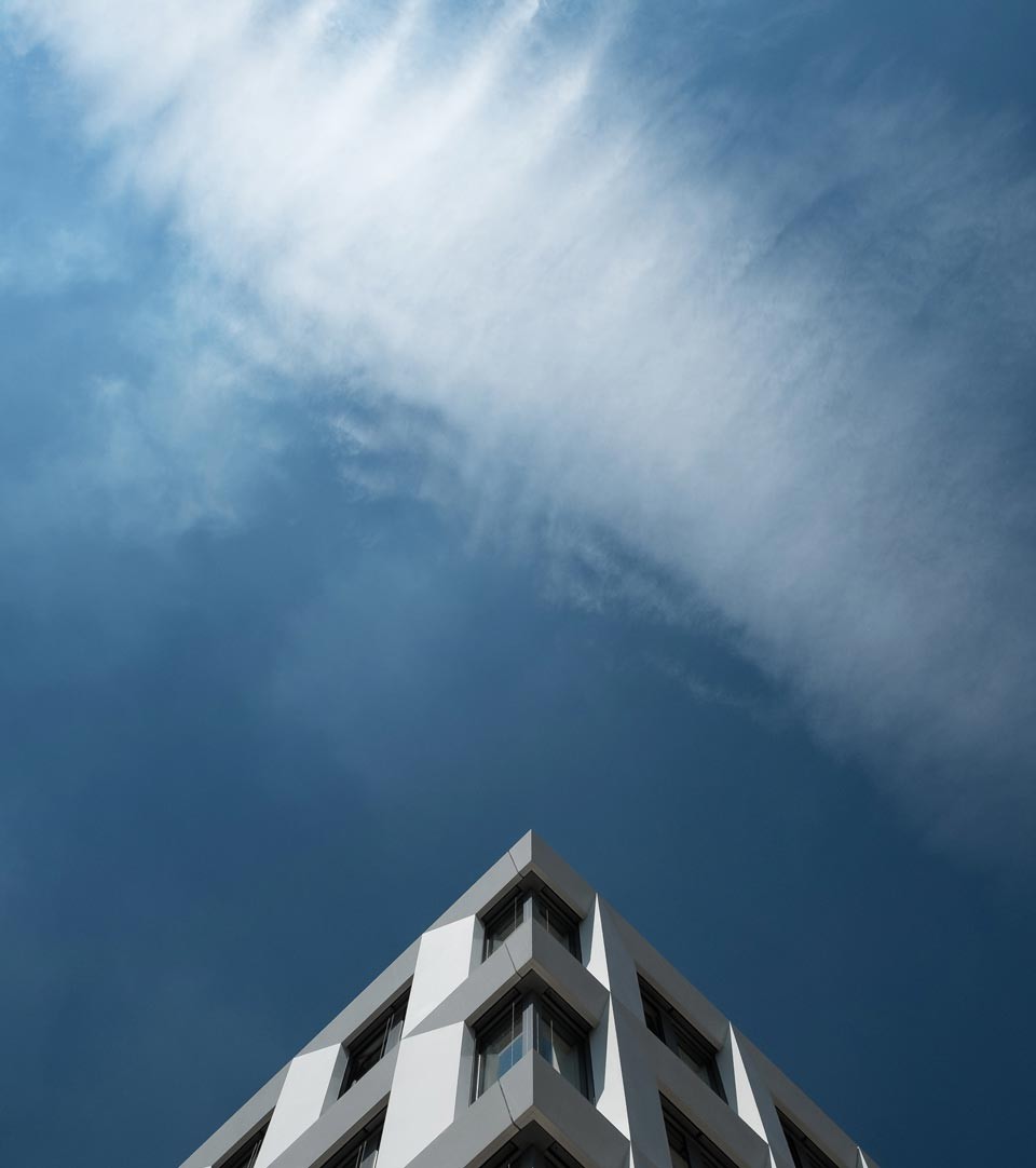 Modern building against a dark blue sky